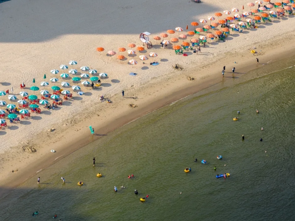 Wide view of Haeundae Beach and its urban waterfront
